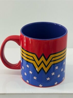 Red and Blue Wonder-Inspired Ceramic Mug with Yellow Emblem